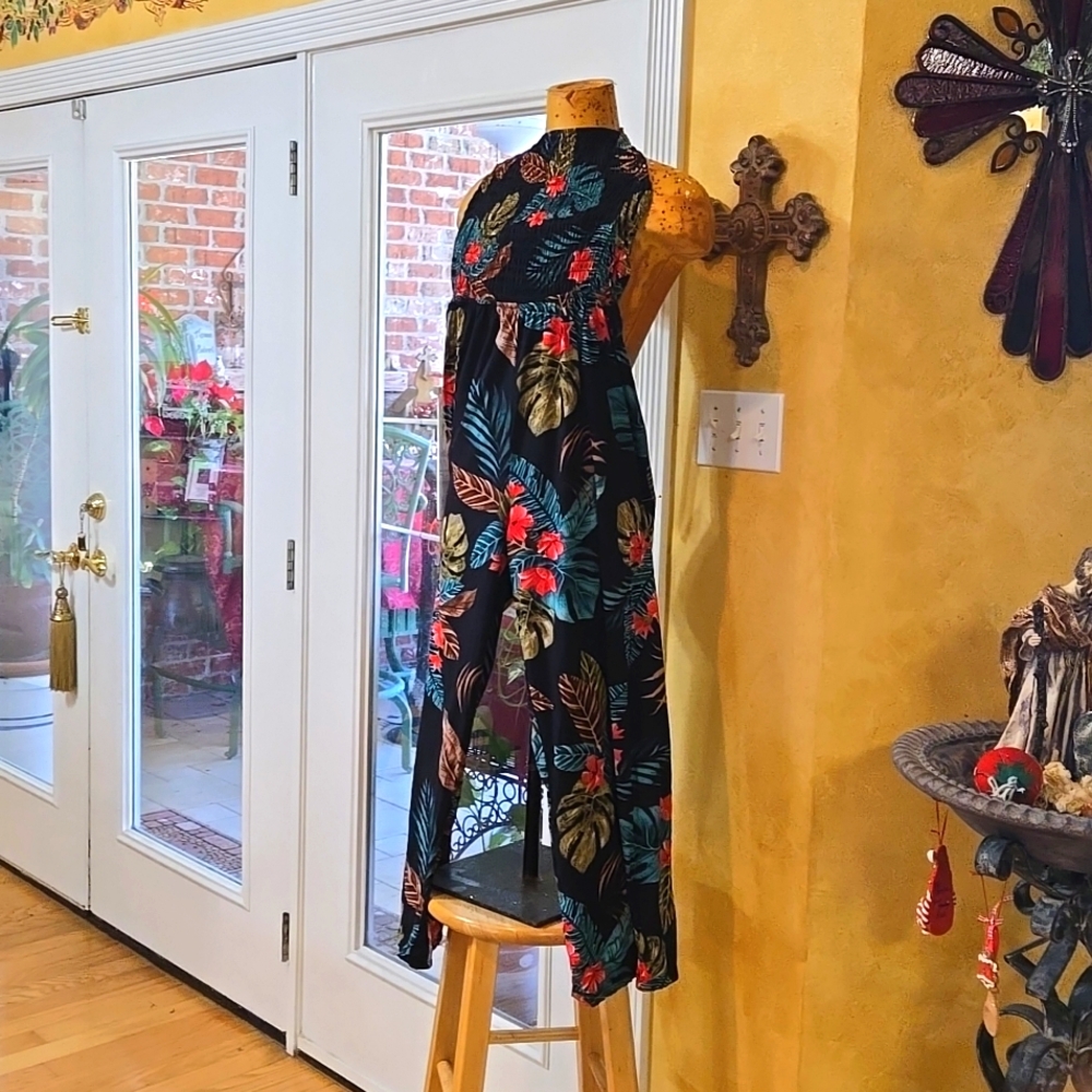 Flower print jumpsuit black green brown brown and pink flowers